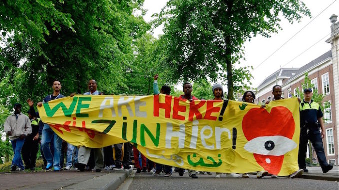 We are here we zijn hier, door Roel Wijnants, via Flickr.