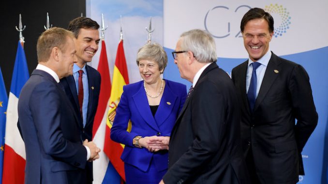 Photo of (from left to right) Donald Tusk, Pedro Sánchez, Theresa May, Jean-Claude Juncker and Mark Rutte at the G20 summit in Argentina. Photo by: Number 10, via Flickr.com